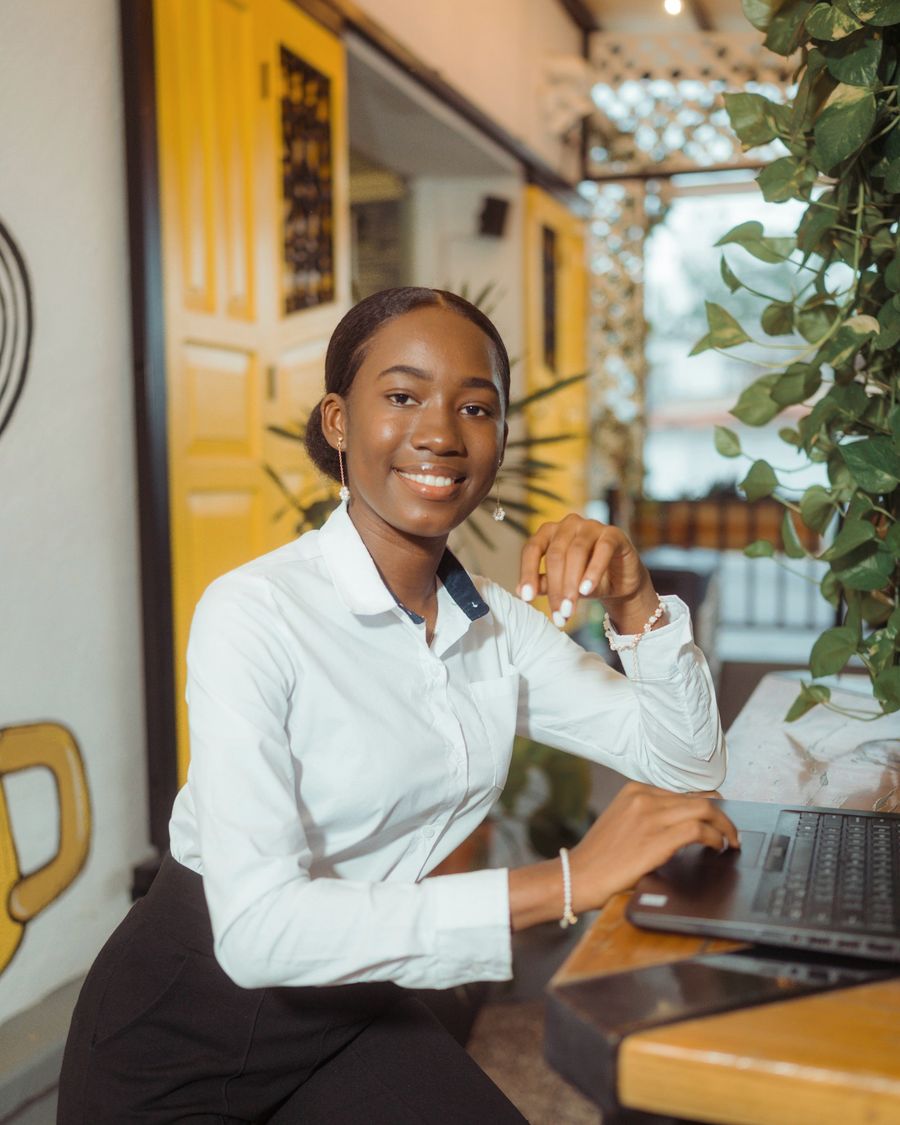 Store owner running her business from her counter
